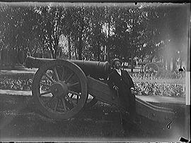 [Man with Cannon in City Park]